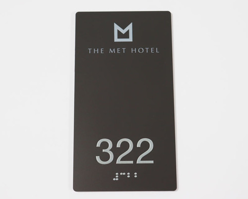 Braille Room Number Sign and Hotel Line of Signs and Numbered Signs